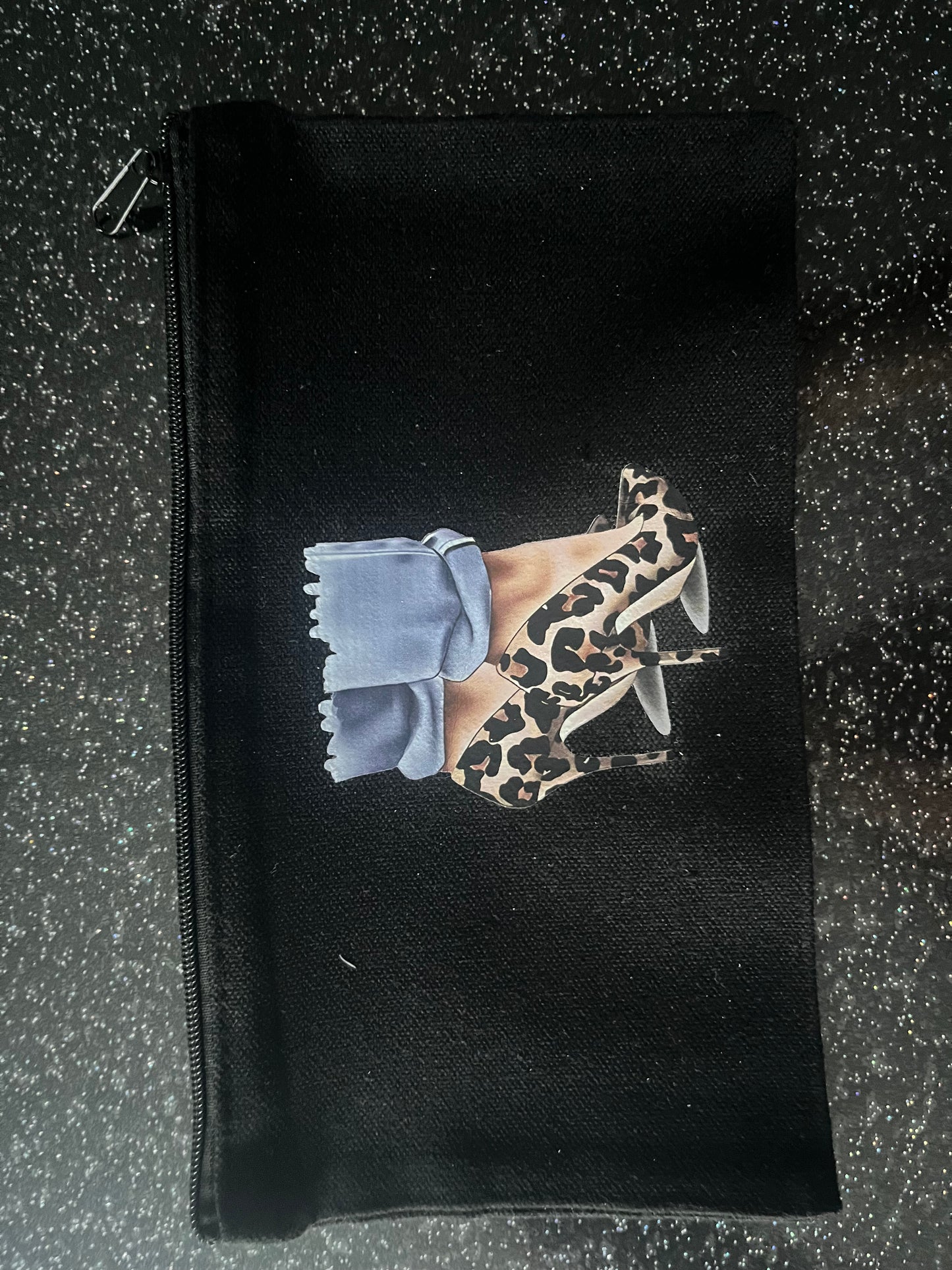 Pochette noire en coton zippée – motifs illustrés